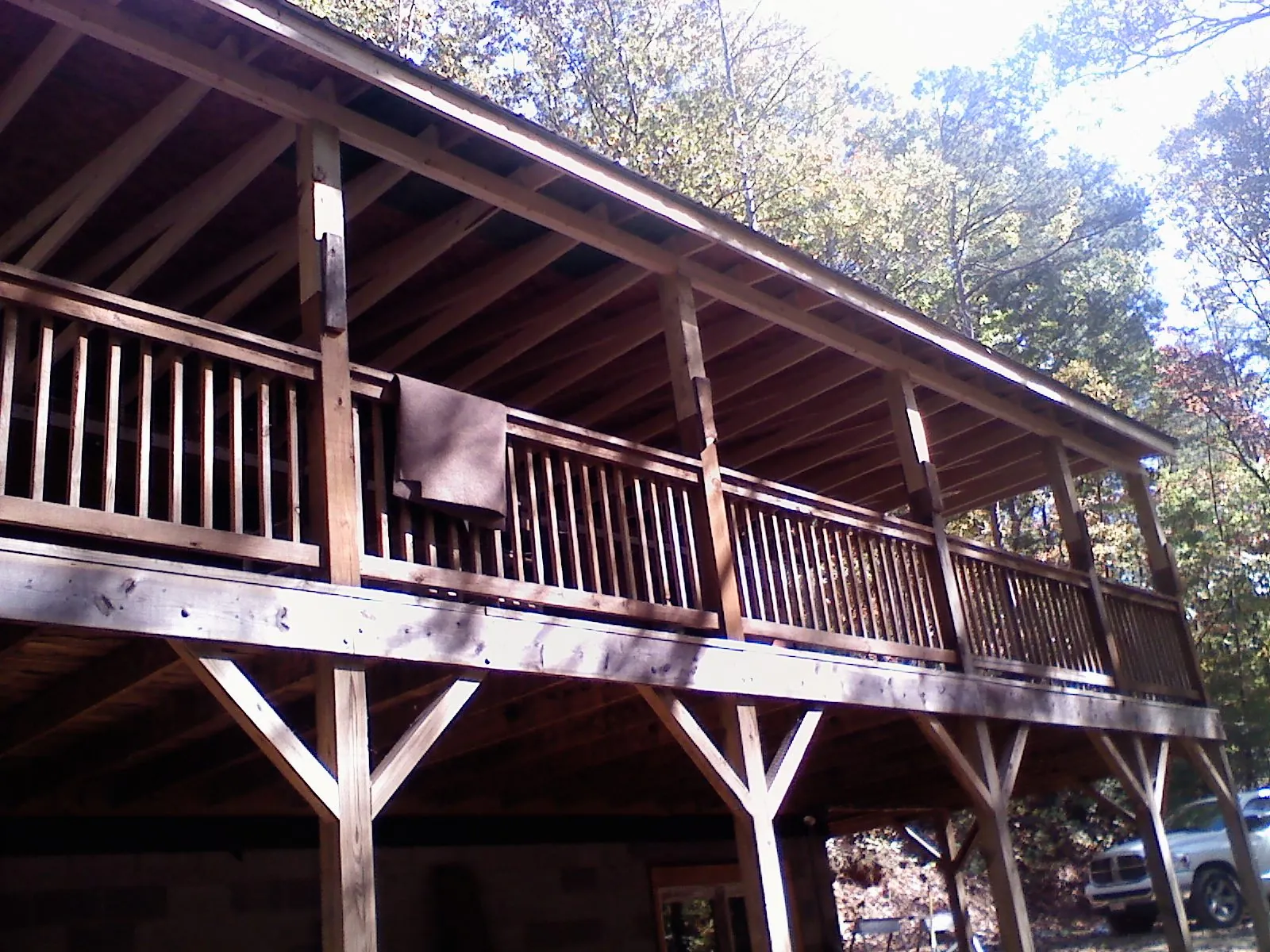 Timber framing under a new elevated porch and deck — Roof Leak Repair in Hayesville by Roofing Brothers